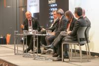 Prof. Kenneth Lee serves as the moderator of a discussion panel (1st from left)